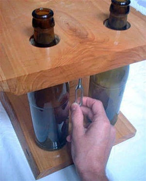 最新diy用酒瓶子自制储物架图解